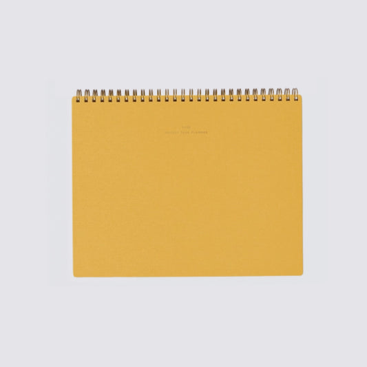 yellow planner for weekly tasks