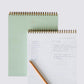 light green notepad for note taking