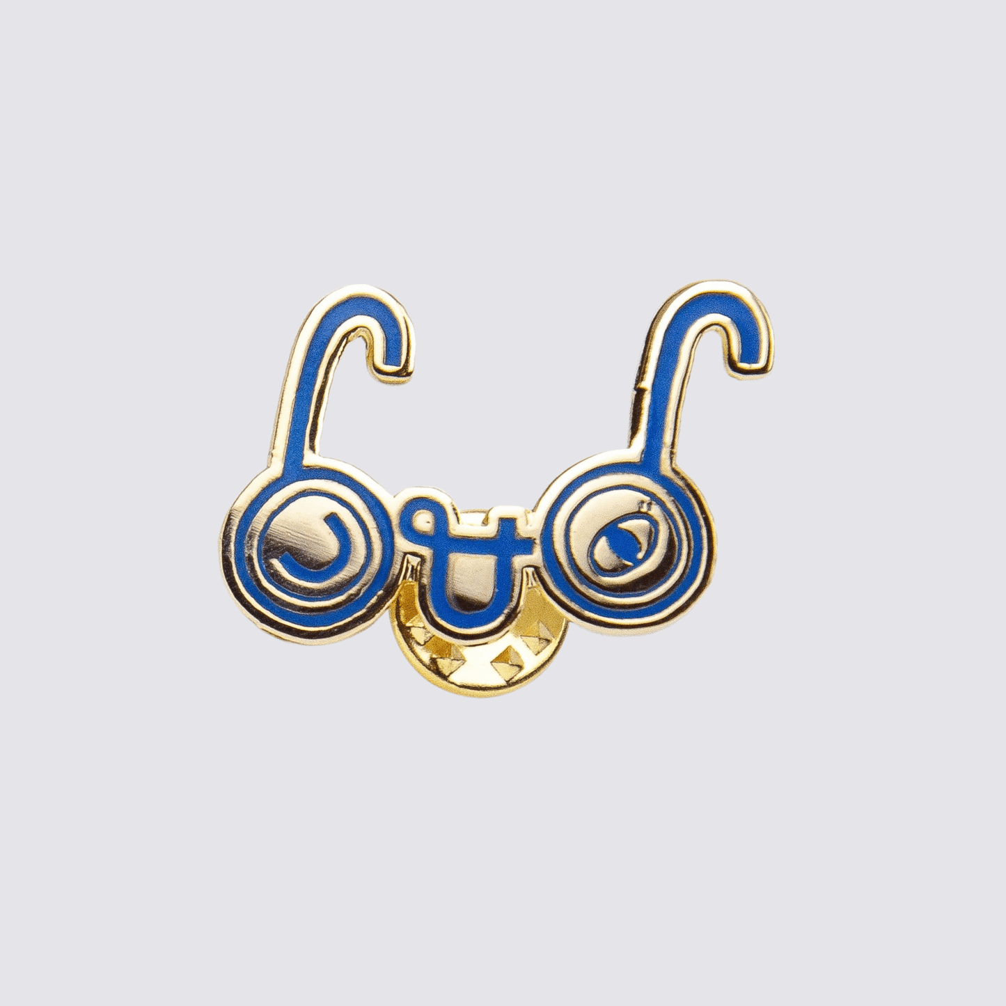 u and eye pin badge