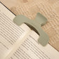 Giant book clip in khaki