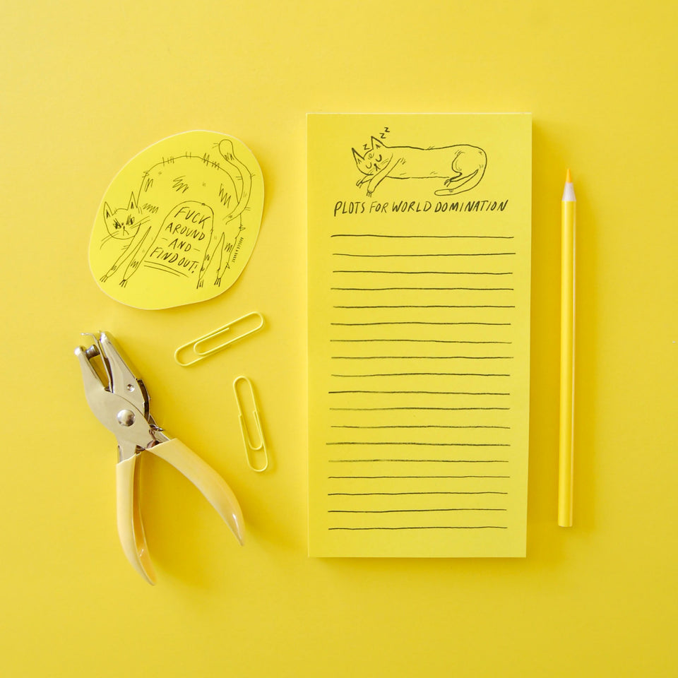 yellow notepad with cat